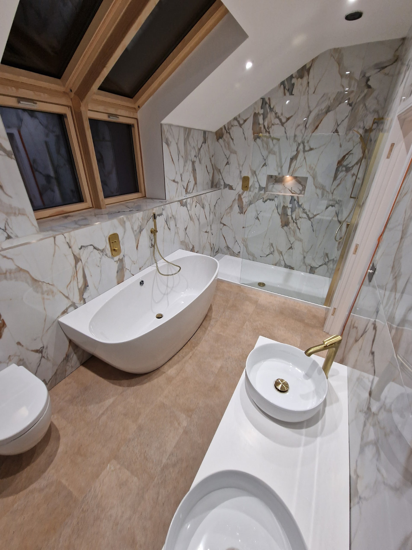 Alt angle of the loft suite showing vessel basin & floating vanity