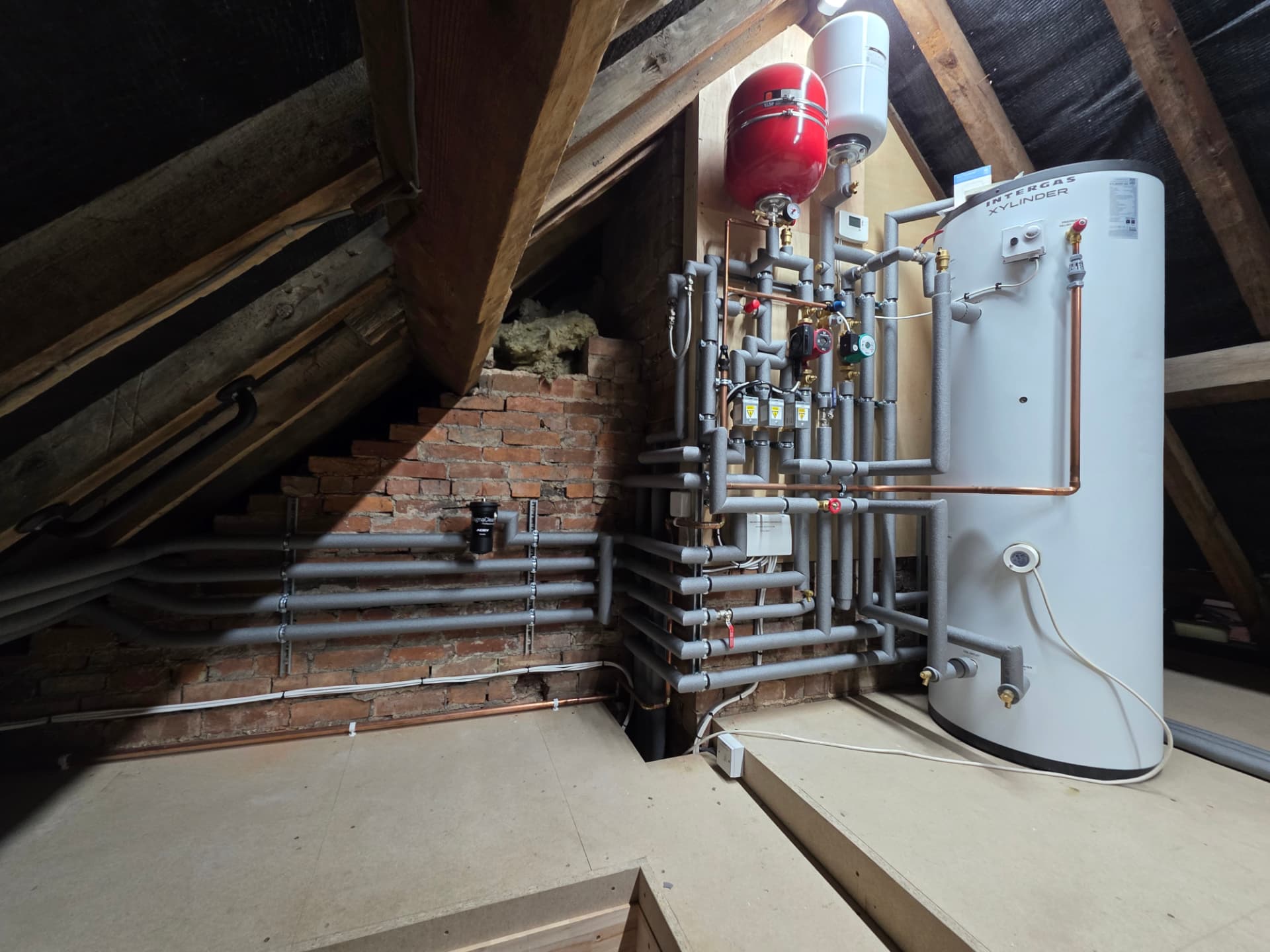 Intergas Xylinder unvented cylinder and insulated manifold in an attic plant room, Warwick
