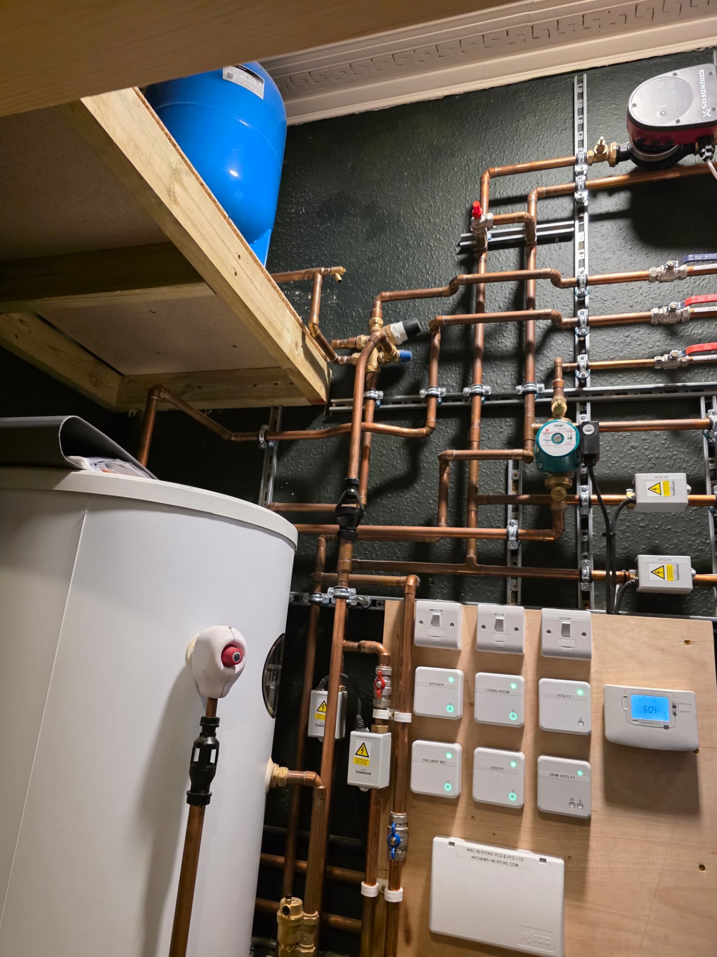 Close-up: labelled sockets, seven-zone smart thermostats & Grundfos pump