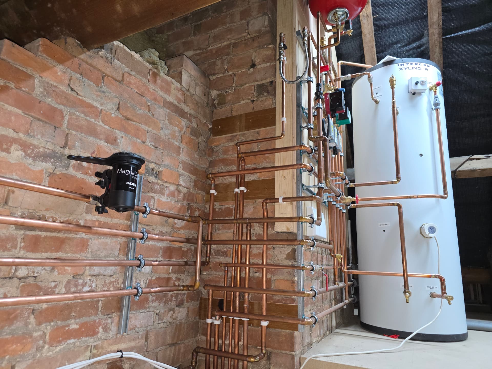 Copper pipework run and MagnaClean Pro2 alongside an Intergas Xylinder, Rugby